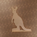 Wooden kangaroo figure on a patterned surface