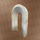 Decorative metal arch on a patterned wall