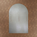 Arched backdrop on a patterned wall