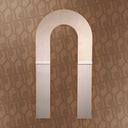 Decorative wall panel with an arch design on a patterned background