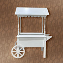 White wooden cart with a roof on a brown patterned background